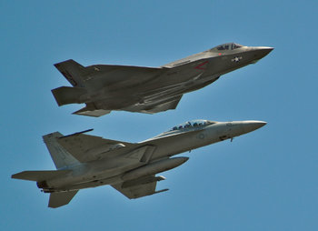 F-35C_of_VFA-101_and_F-18F_of_VFA-122_over_Eglin_AFB_2013.JPG