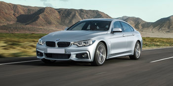 bmw-4-series-gran-coupe-silver-driving-front-1.jpg