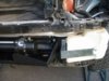 Изменение размера IMGP0250Bracket that holds the washer bottel in now that the bumper has gone..jpg