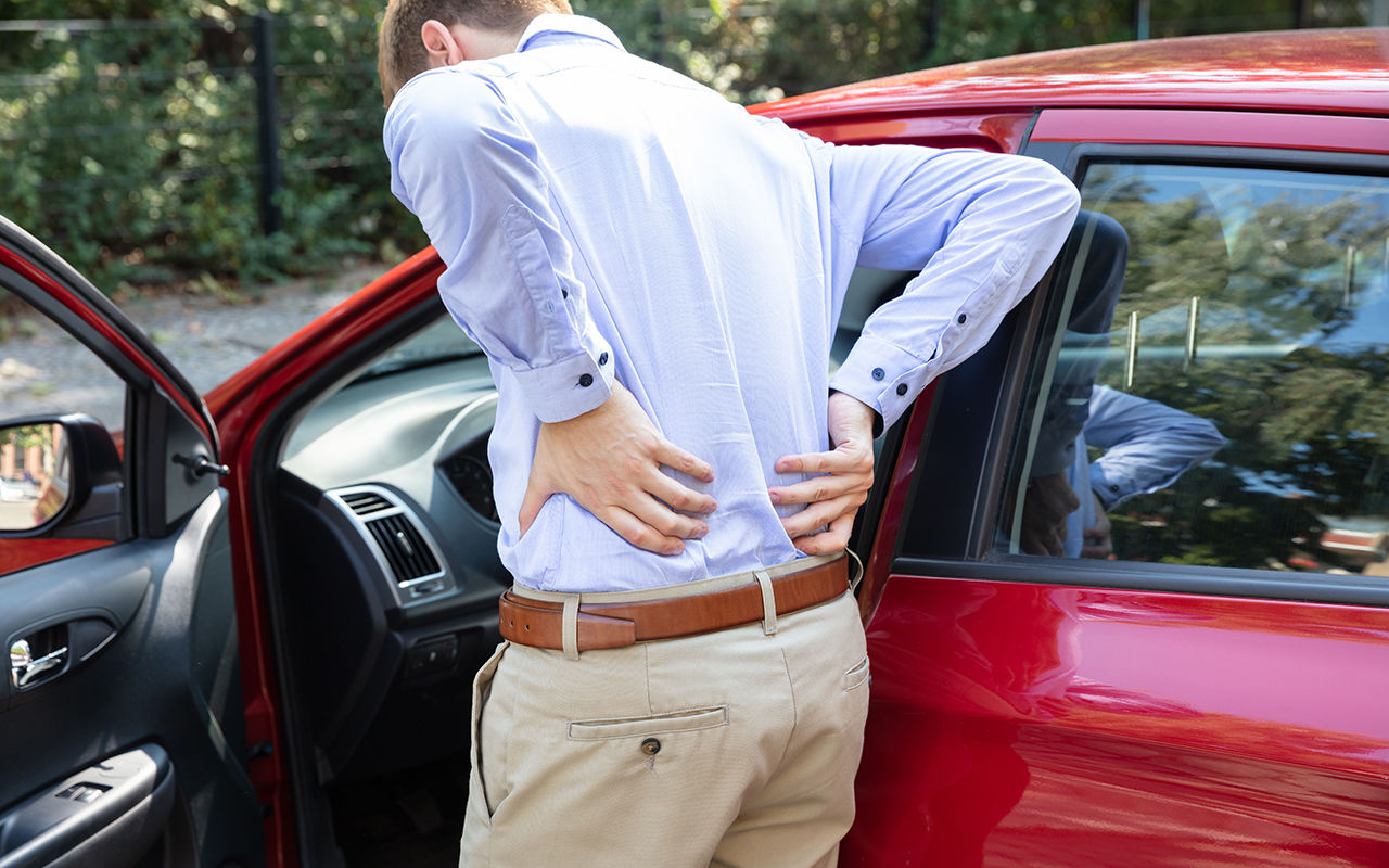 Driver Standing Having Backpain After Driving Car