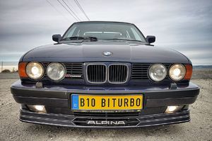 327999