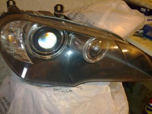 Фара правая AHL E70